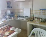 cuisine, avec table pour 4 pers.