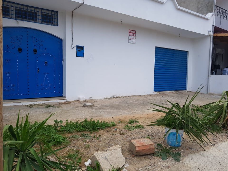 Local commercial avec studio