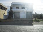 un grand garage + appt inachevé