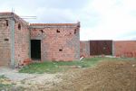 Tarrain avec une maison en cours de construction