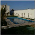 Villa avec piscine plus dépôt et magasin